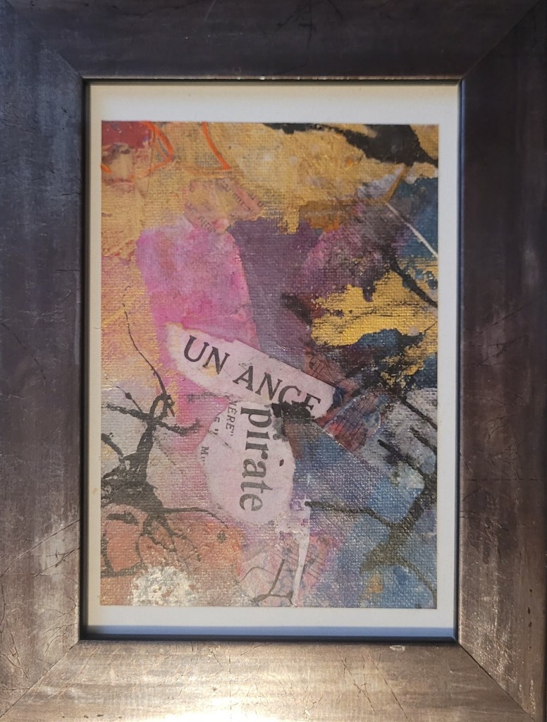 3. Ange pirate

(23,5 × 18 cm encadré)
"UN ANGE pirate" : le collage intrigue et séduit. Une figure hybride, libre et indomptable, s’invite sur la toile, entre orage et tendresse. ⚓👼
